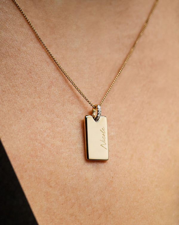 Model wearing Yellow Gold Engravable Rectangle Pendant Necklace.