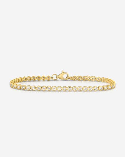 Flat lay image of Bezel Mini Diamond Tennis Bracelet in yellow gold