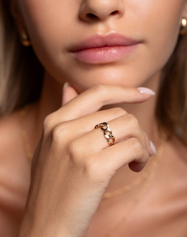 14k yellow gold curb chain ring shown on model