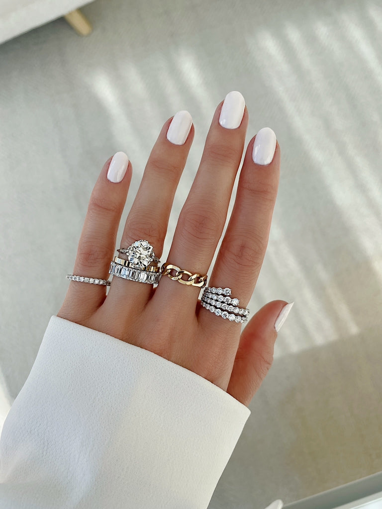 cartier love ring stacked with engagement ring