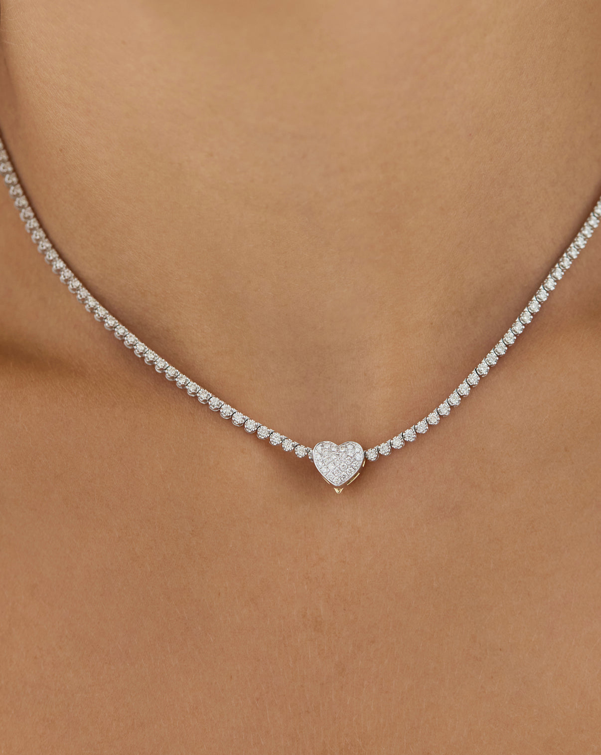 Reversible Pavé Diamond Heart Bead shown on pave side with mini diamond tennis necklace