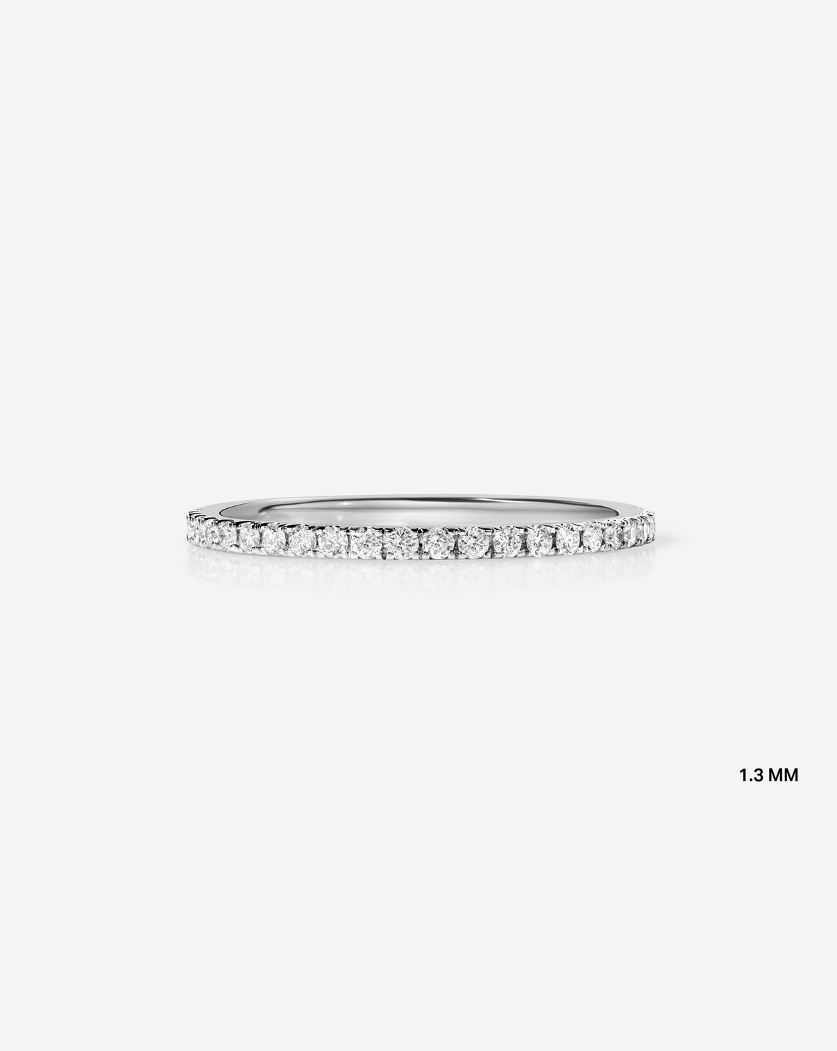 Flat lay of 1.3 mm Perfect Pave Ring in 14k White Gold Eternity