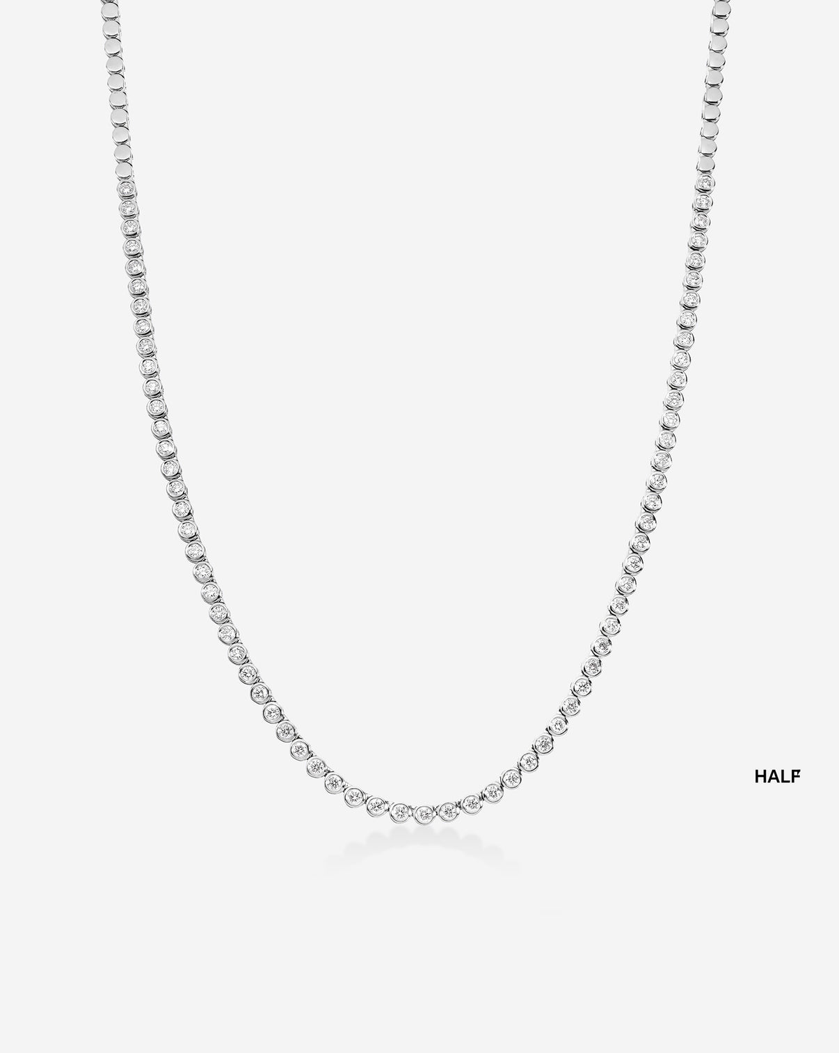 ghost image of bezel tennis necklace half in 14k white gold