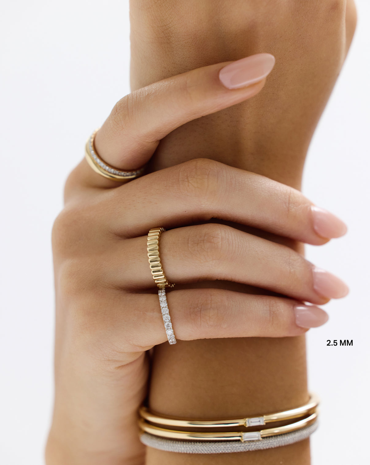 Model wearing 2.5 mm Perfect Pave Diamond Ring with other rings and bangles GLOBAL