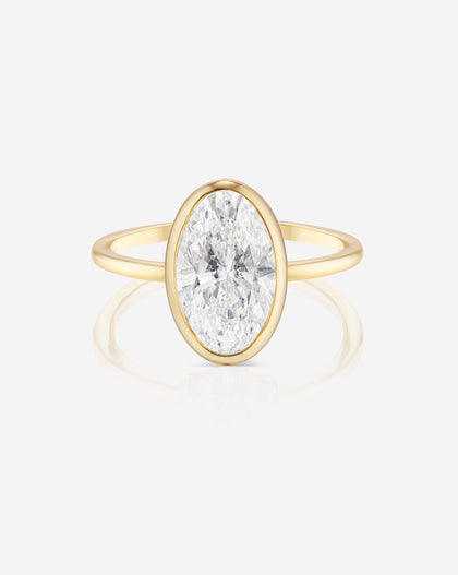 Front view of the 2.50 Oval in the Whisper Thin® Bezel Natural Diamond Ring in 14K Yellow Gold