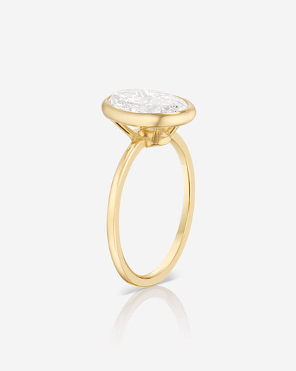 Side view of the 2.50 Oval in the Whisper Thin® Bezel Natural Diamond Ring in 14K Yellow Gold