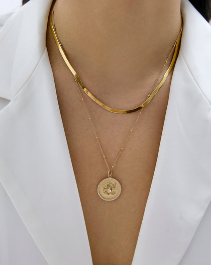  herringbone chain necklace on-model paired with another necklace global 