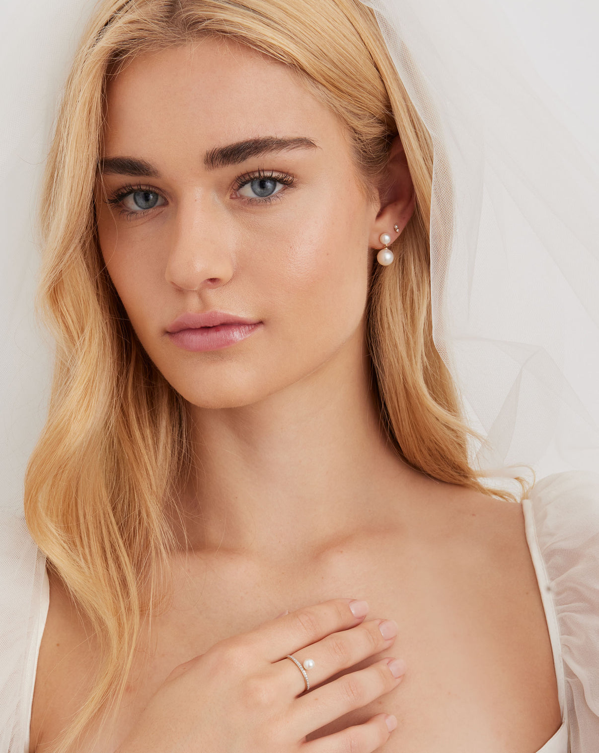 Pearl Duo Dangle Earrings on bride styled with pearl ring