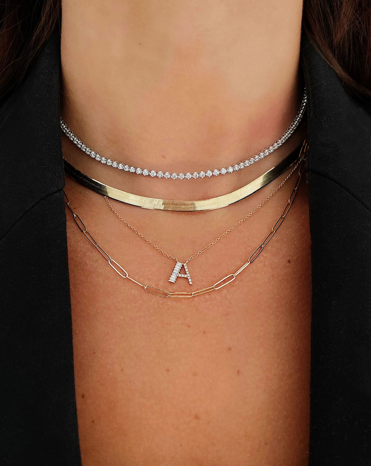 Baguette + Pavé Initial Necklace letter A styled with the Multiway Diamond Tennis Necklace + Double Wrap Bracelet, Herringbone Chain Necklace and Jumbo Link Multiway Necklace + Double Wrap Bracelet