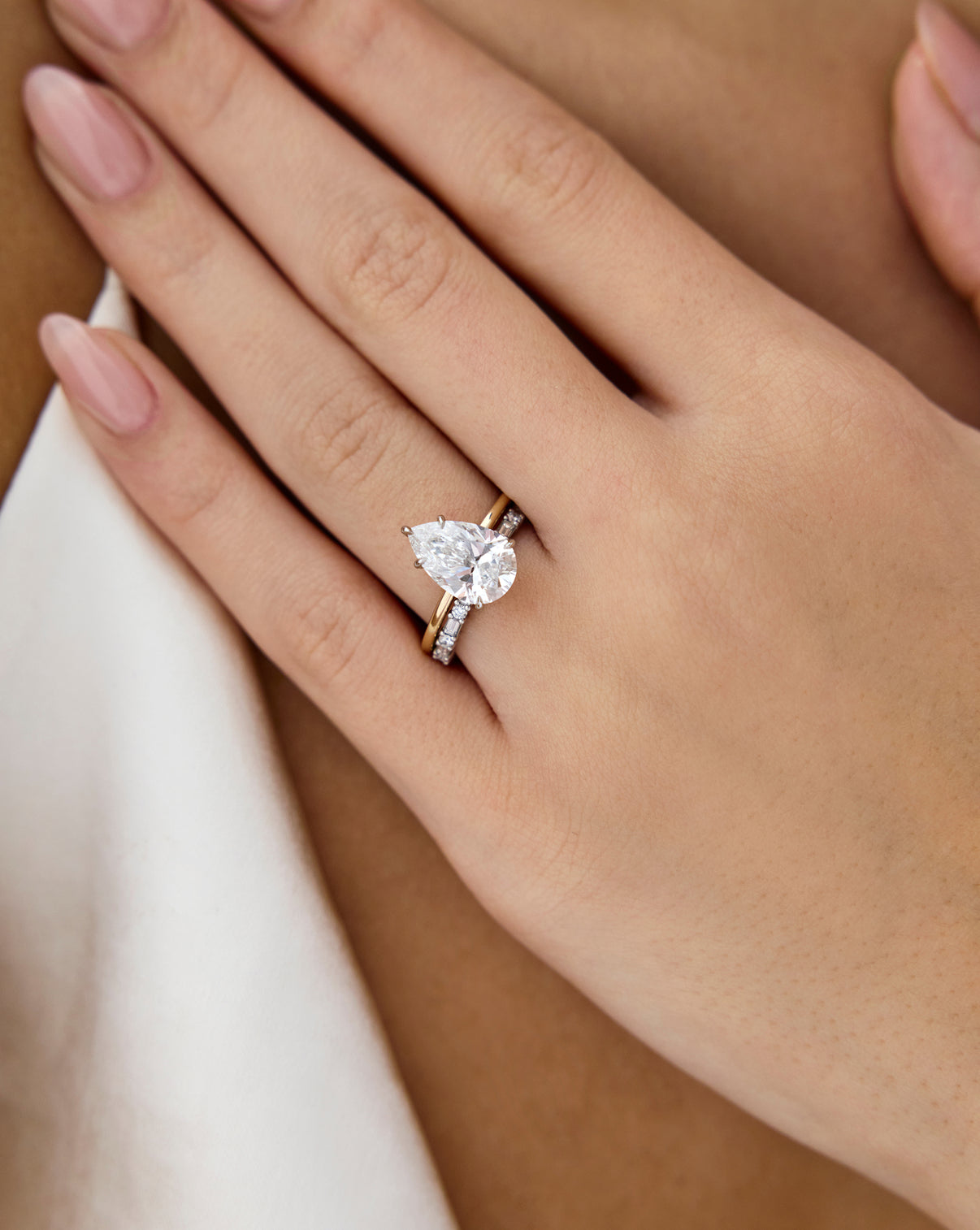 Ring Concierge Baguette + Round Eternity Band Platinum on model paired with diamond engagement ring