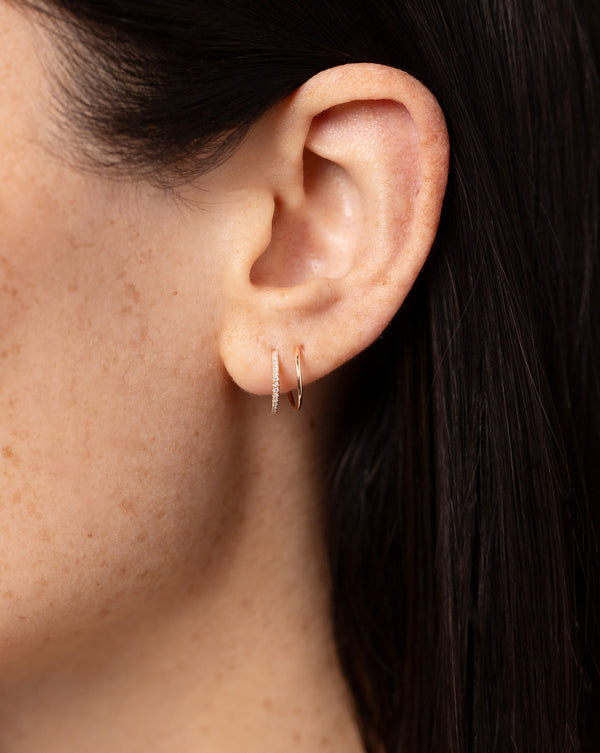 Pavé Spiral Threader Earrings shown close up on ear of model