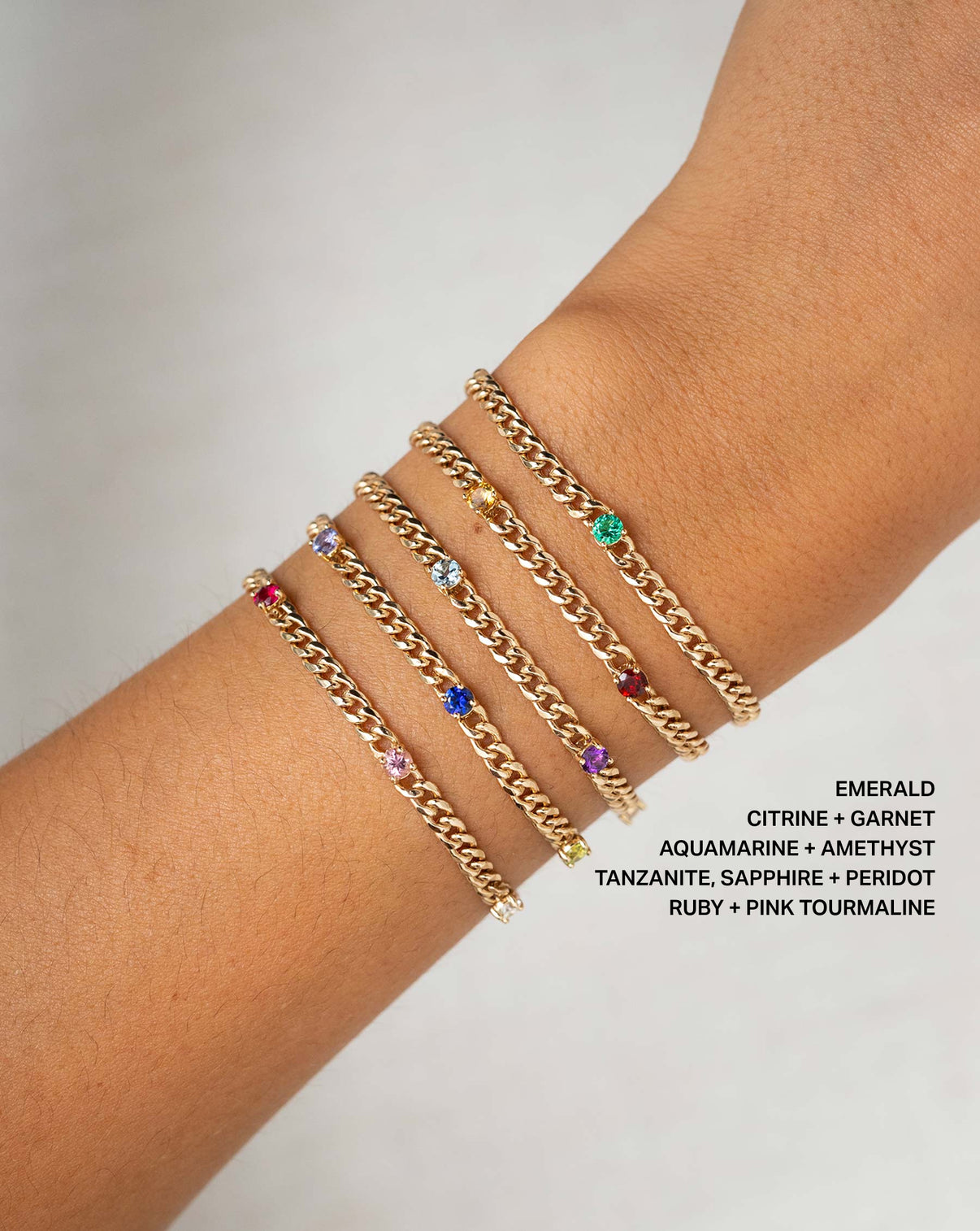 Five Ring Concierge Bracelets Personalized Curb Chain Birthstone Bracelets stacked on wrist