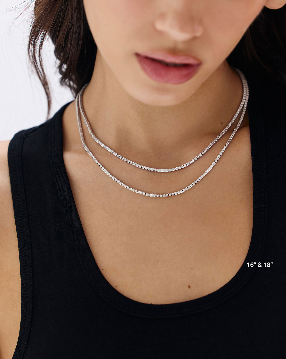 Model showcasing Classic Diamond Tennis Necklace as the perfect statement piece for any occasion GLOBAL