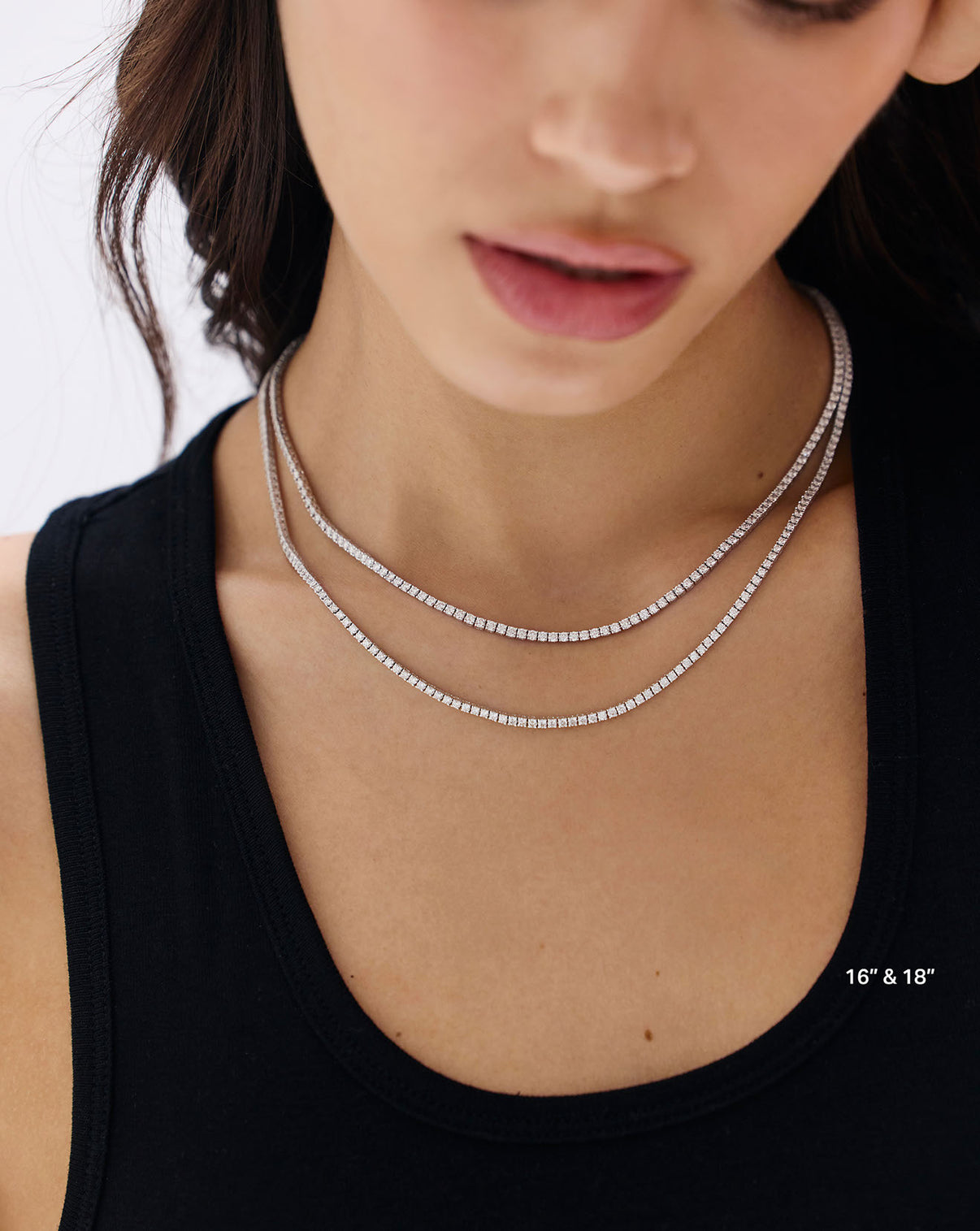Model showcasing Classic Diamond Tennis Necklace as the perfect statement piece for any occasion GLOBAL
