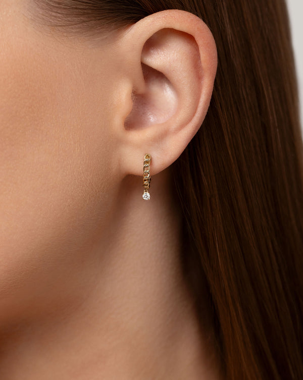 14k yellow gold chain hoop earring with single round-cut diamond show on model