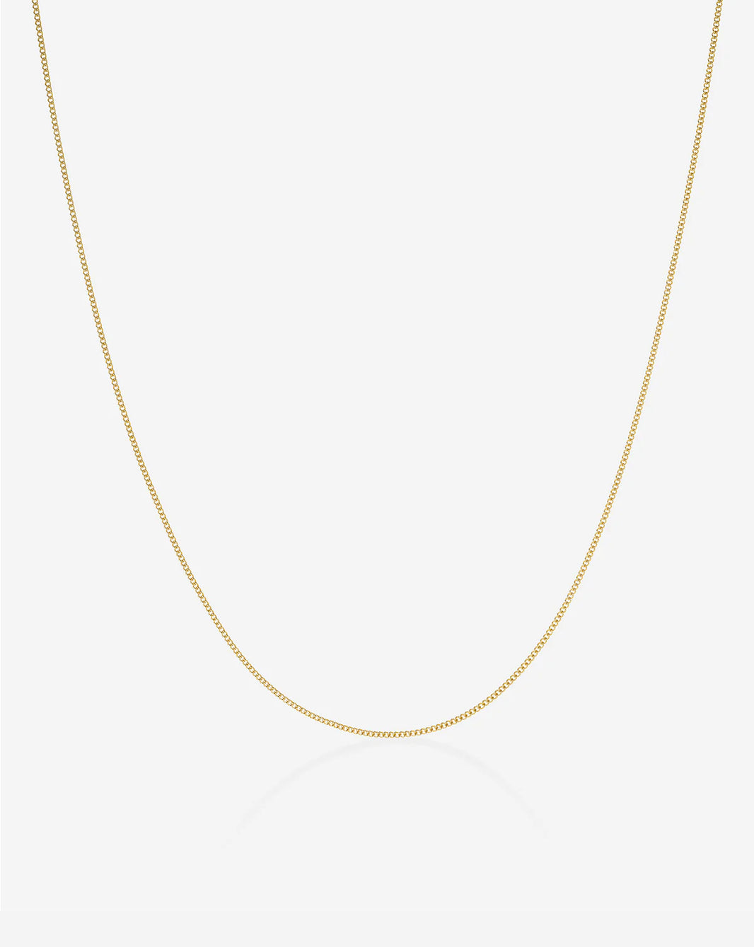 ghost image of diamond cut curb chain necklace in 14k yellow gold