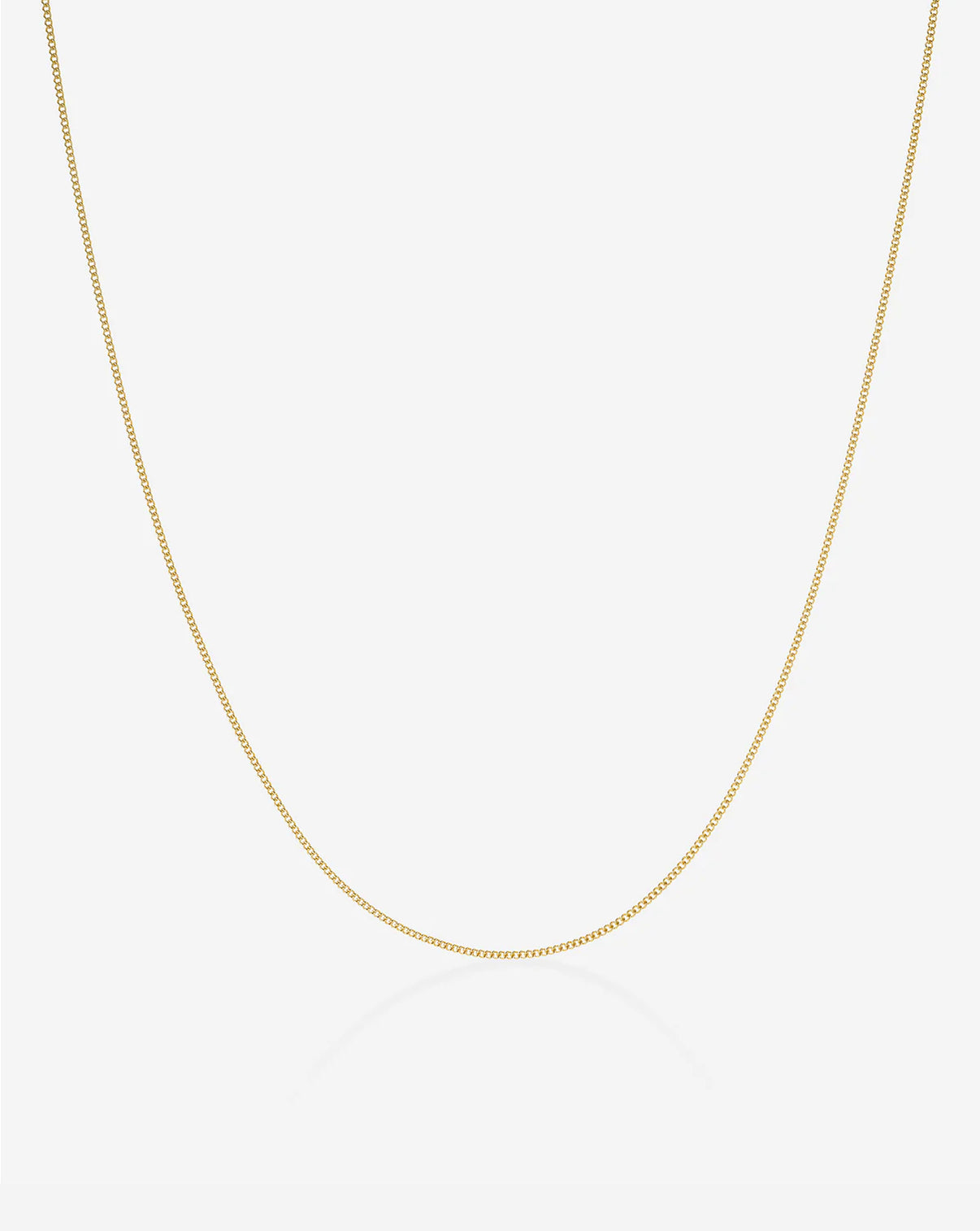 ghost image of diamond cut curb chain necklace in 14k yellow gold