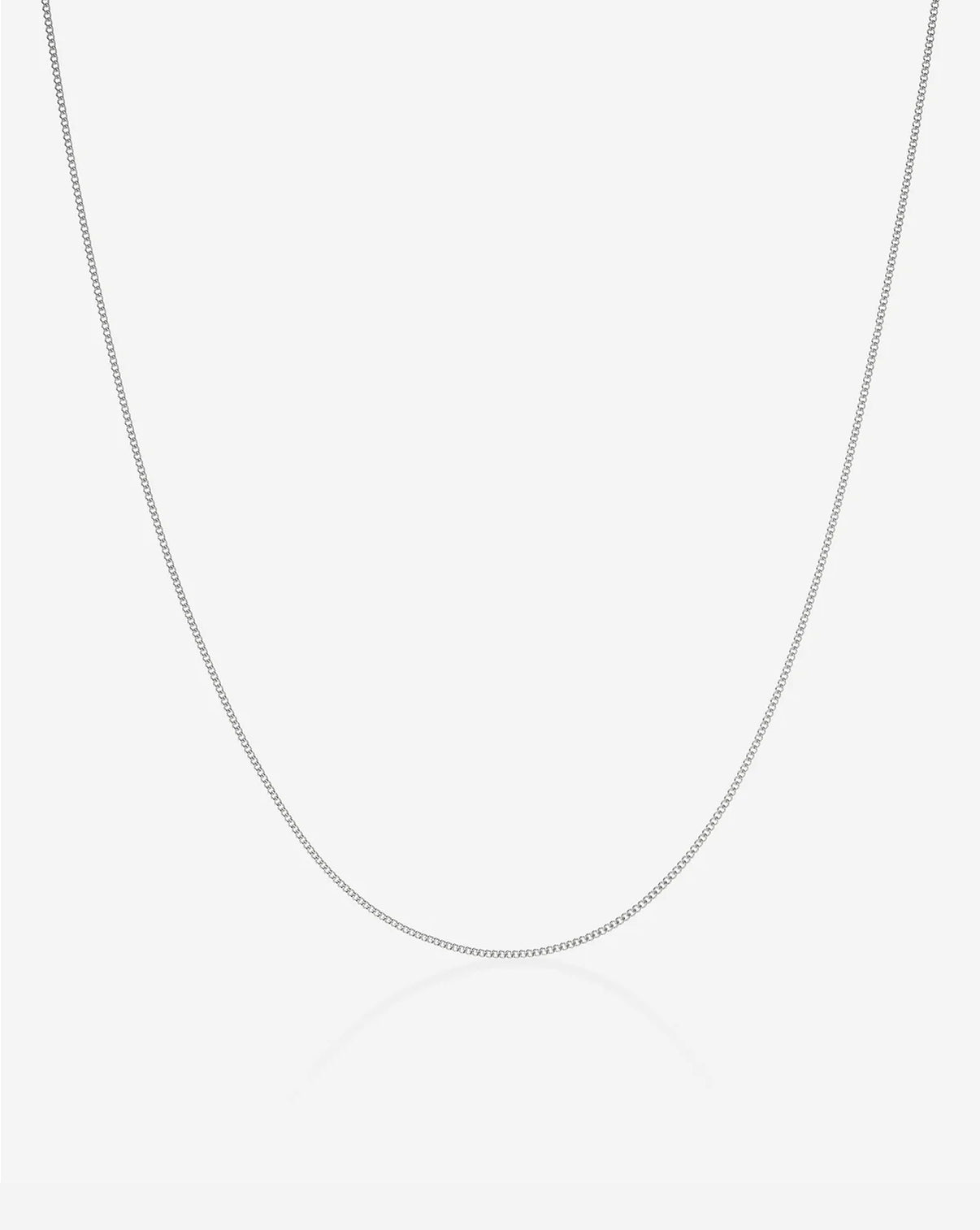 ghost image of diamond cut curb chain necklace in 14k white gold