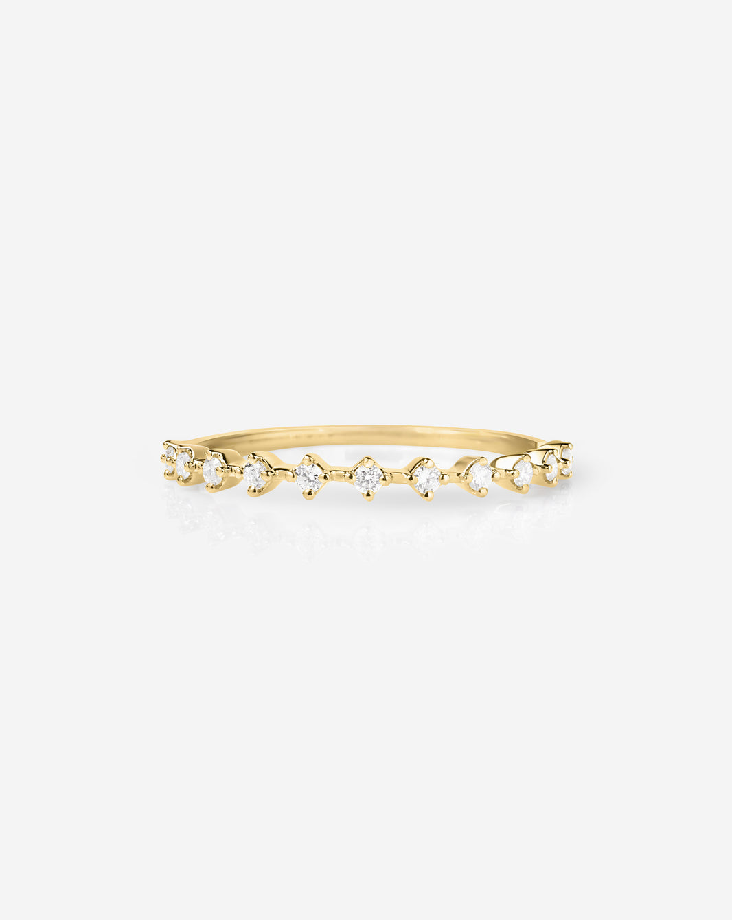 Flat lay of Ring Concierge 14k Yellow Gold Diamond Station Stackable Ring