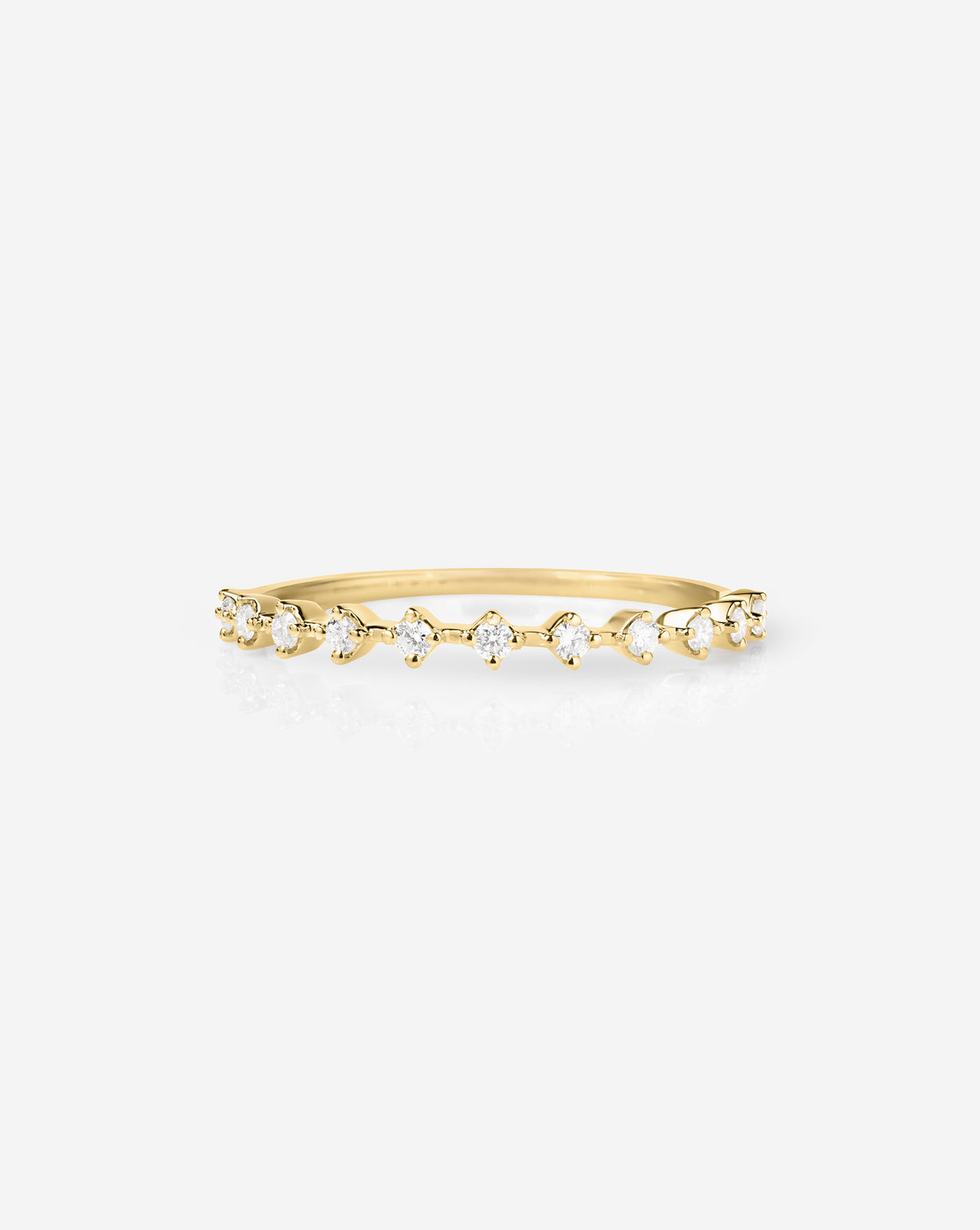 Flat lay of Ring Concierge 14k Yellow Gold Diamond Station Stackable Ring