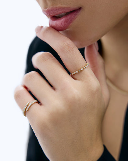 Diamond station stackable ring worn on hand demonstrating fit and sparkle