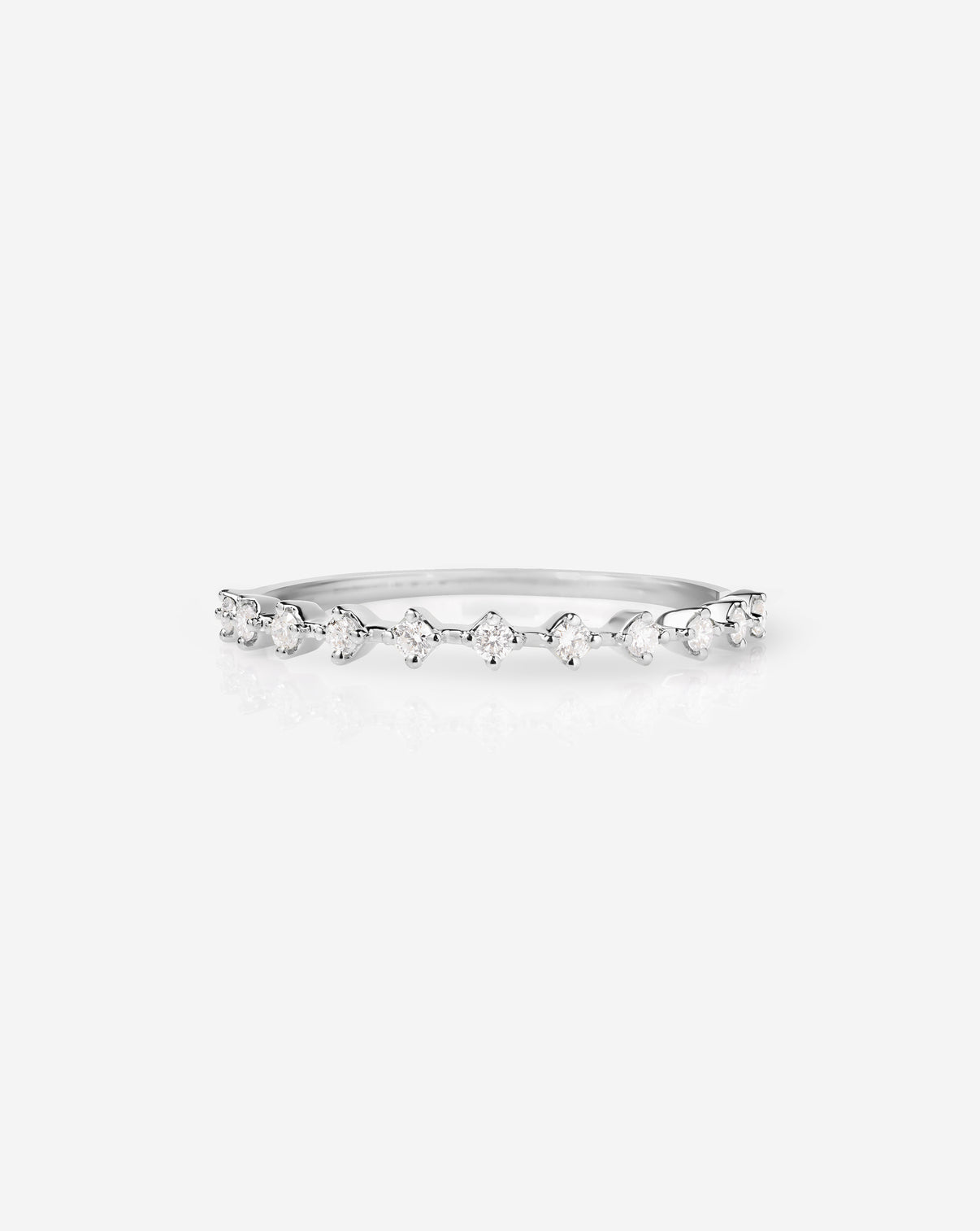 Flat lay of Ring Concierge 14k White Gold Diamond Station Stackable Ring