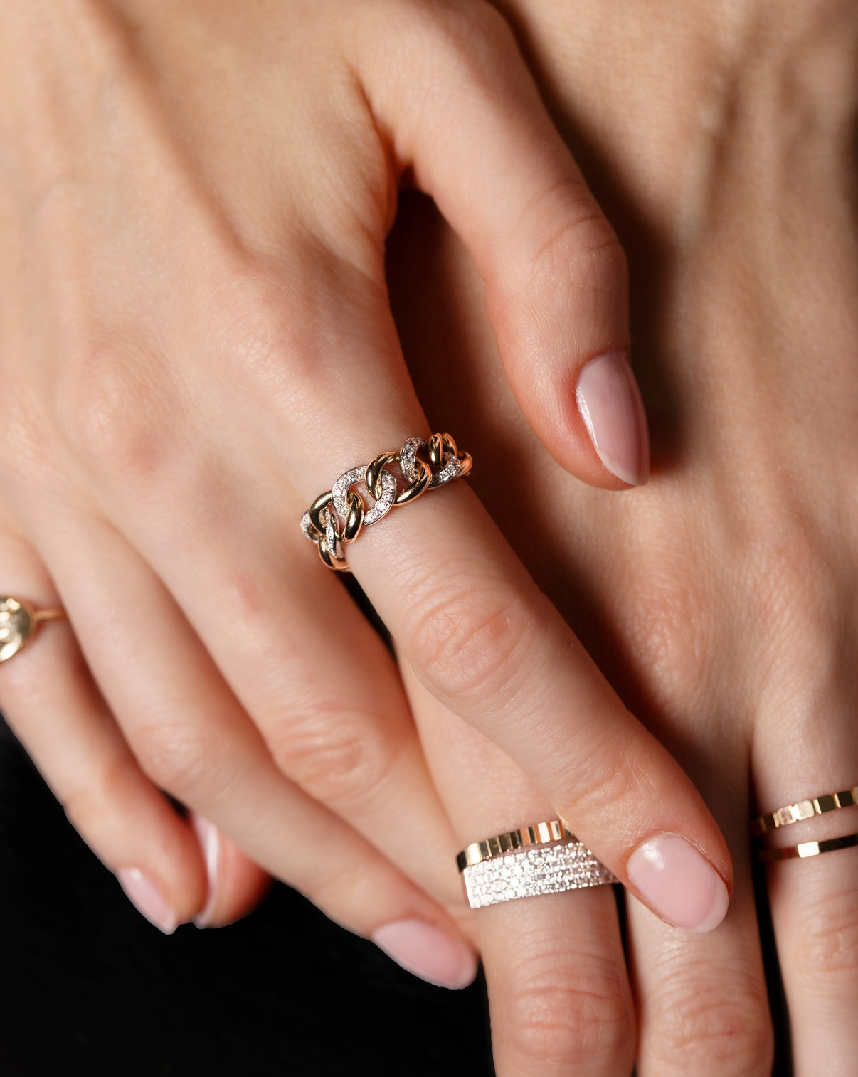 14k yellow gold and diamond chain ring shown on model