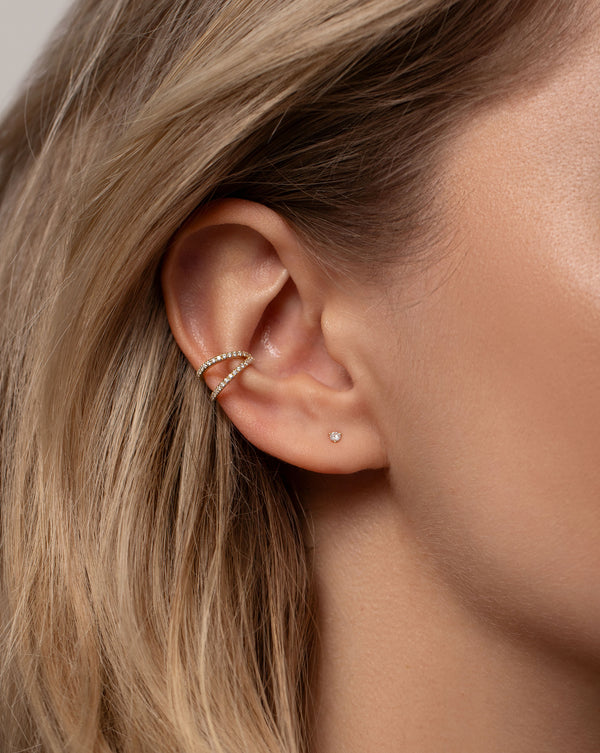 open double row diamond ear cuff and small round-cut diamond stud on model