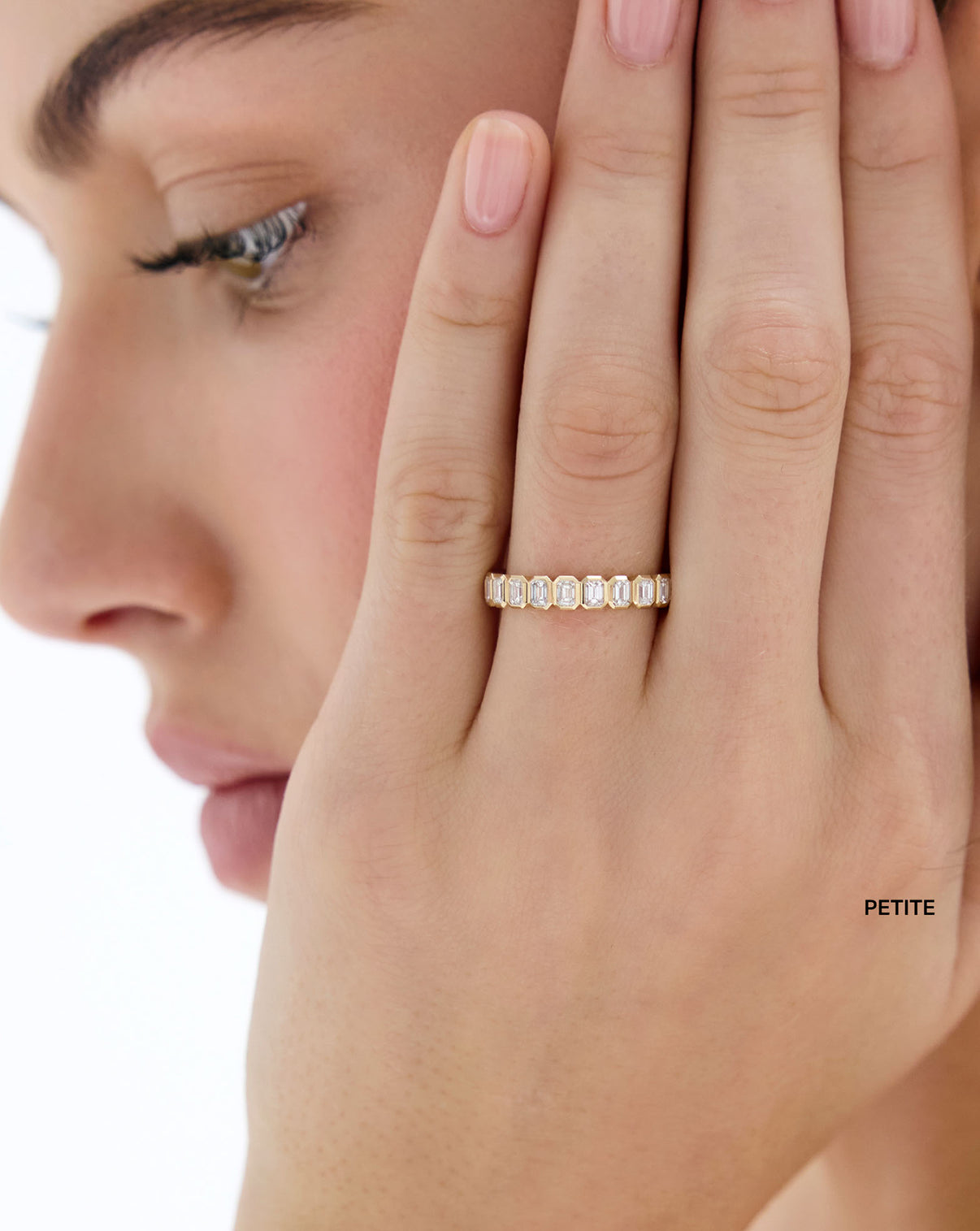 model wearing petite 2 carat weight Diamond Emerald Bezel Band in 14K Yellow Gold global