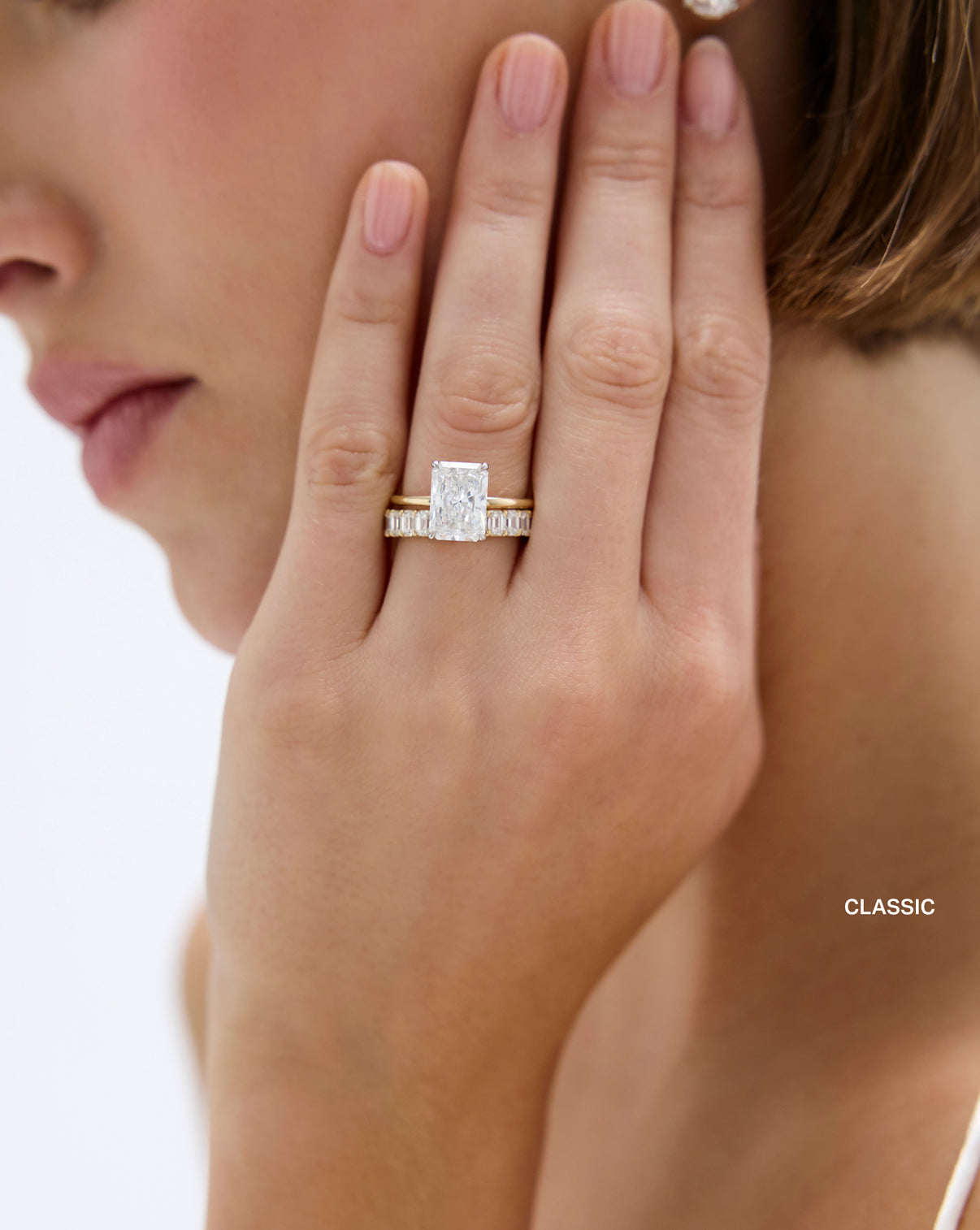 classic 3.5 carat weight emerald diamond eternity band stacked with a diamond engagement ring global