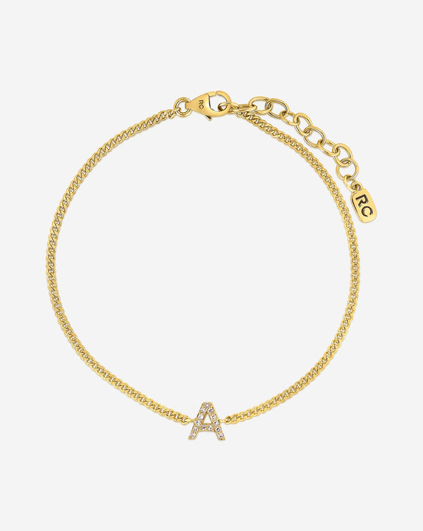 Diamond Initial Bracelet flat lay letter A in yellow gold