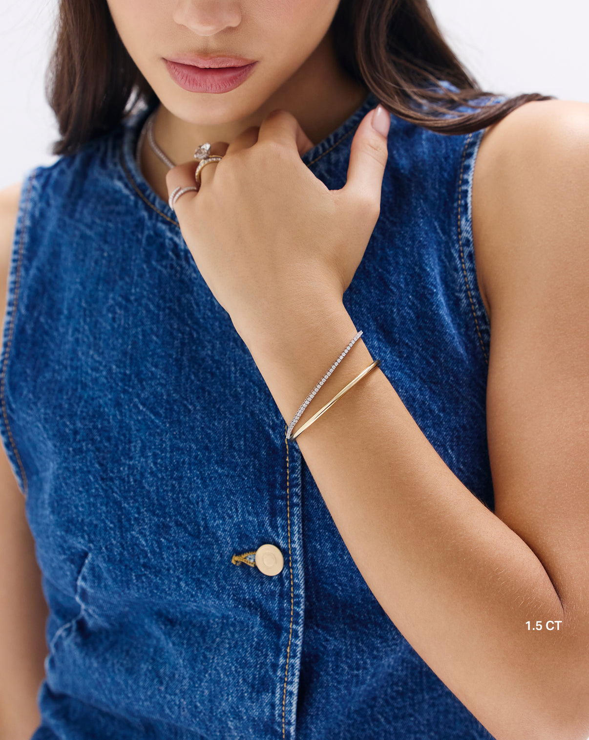 ON-MODEL IMAGE wearing jean vest and classic diamond tennis bracelet global