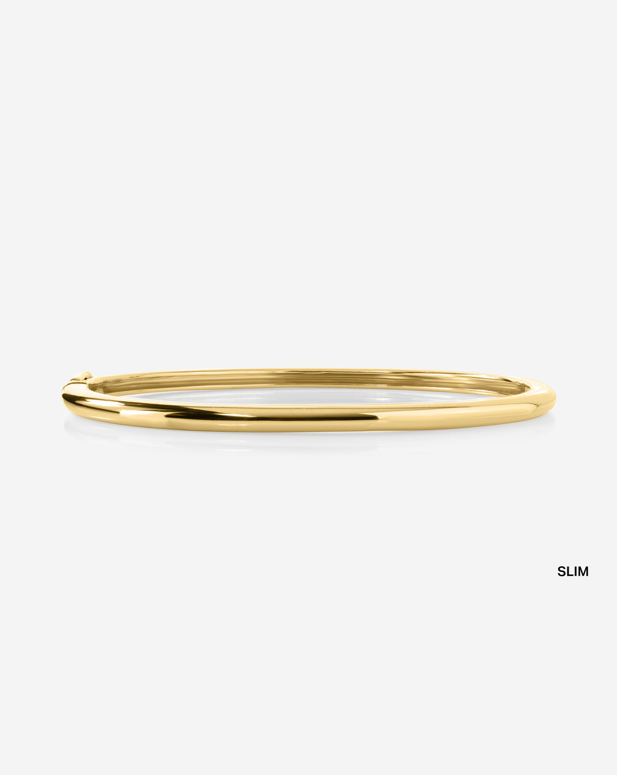 Slim Stackable Gold Cloud Bangle bracelet in 14k yellow gold flat lay detail view showing organic cloud shape and texture