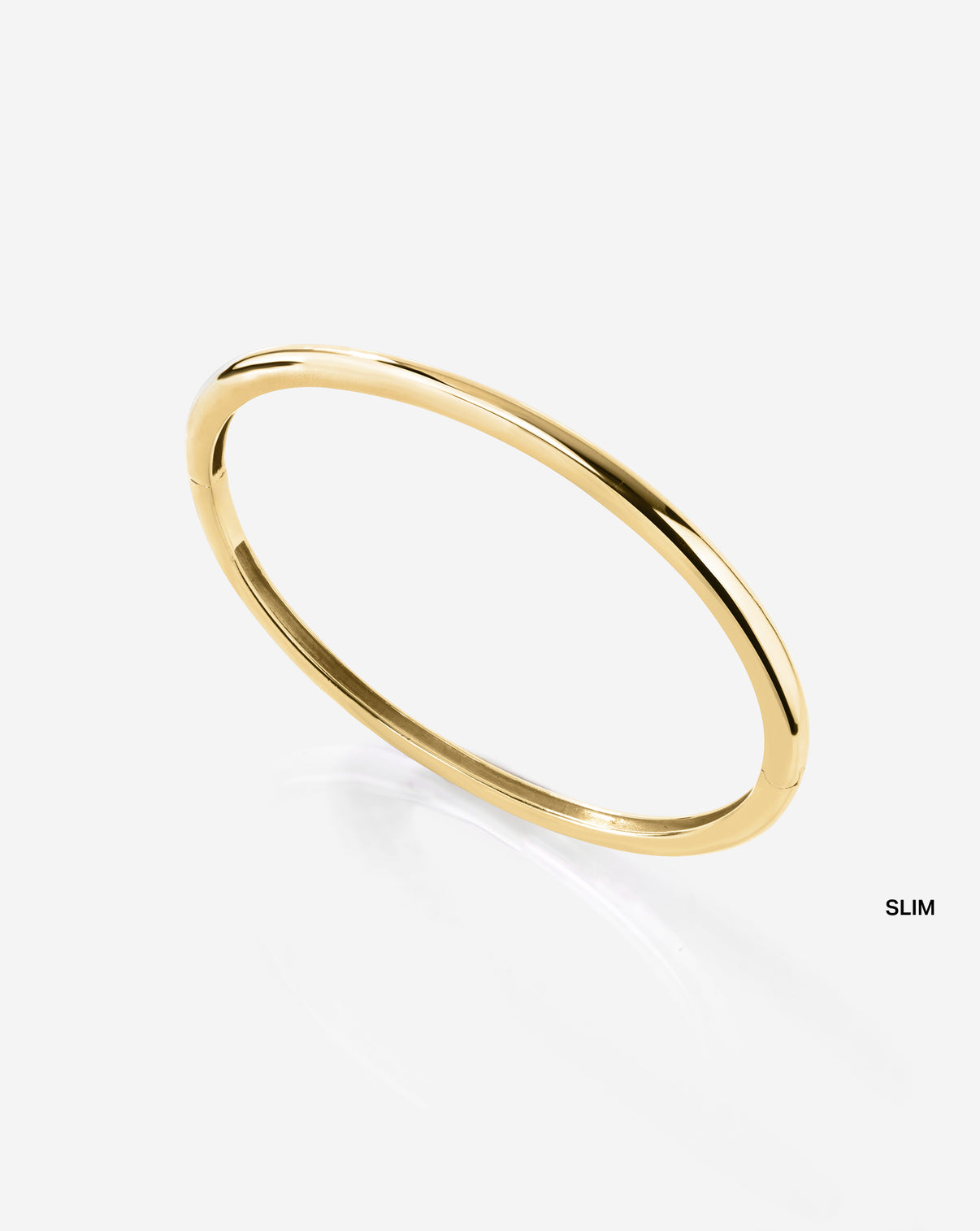 Slim Stackable Gold Cloud Bangle bracelet in 14k yellow gold side detail view showing organic cloud shape and texture