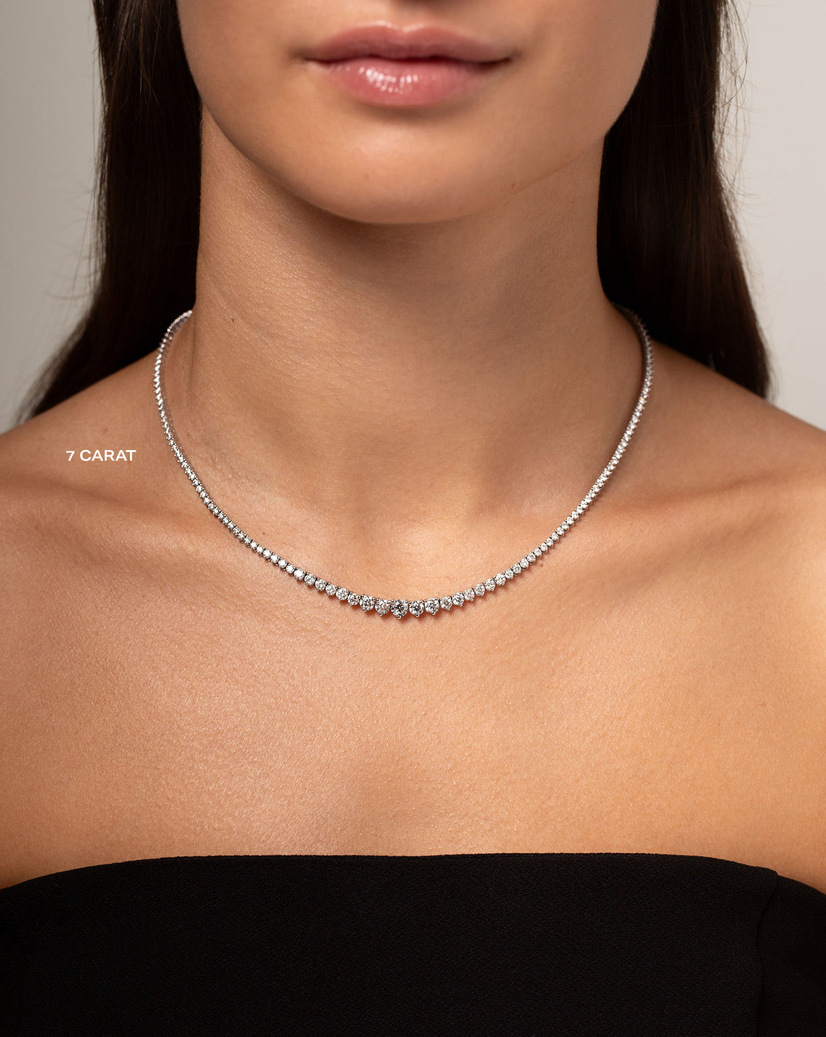 7 ct Graduated Diamond Tennis Necklace shown on neck of model