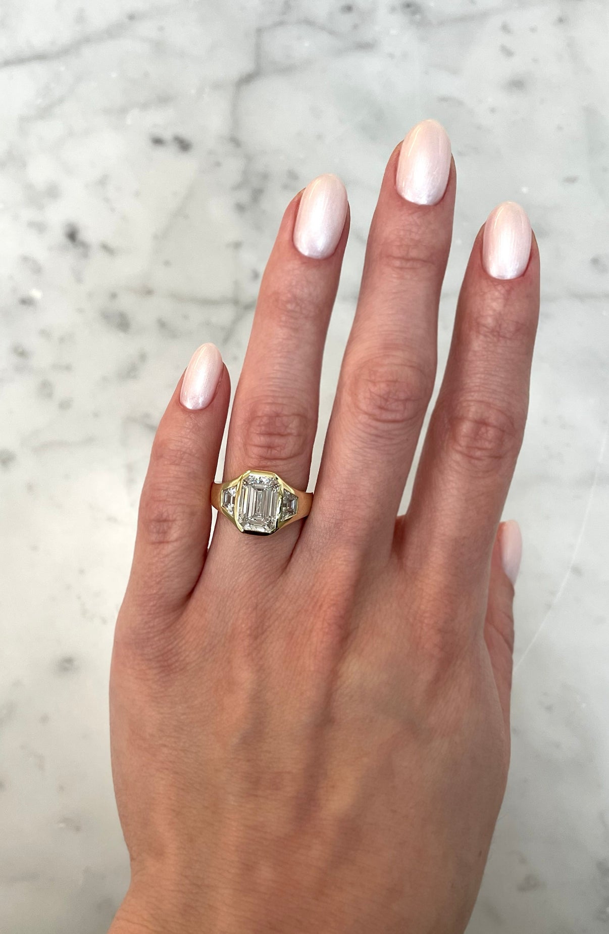 Ring Concierge Emerald Lab Diamond in Trinity Bezel 14K Yellow Gold Engagement Ring on model