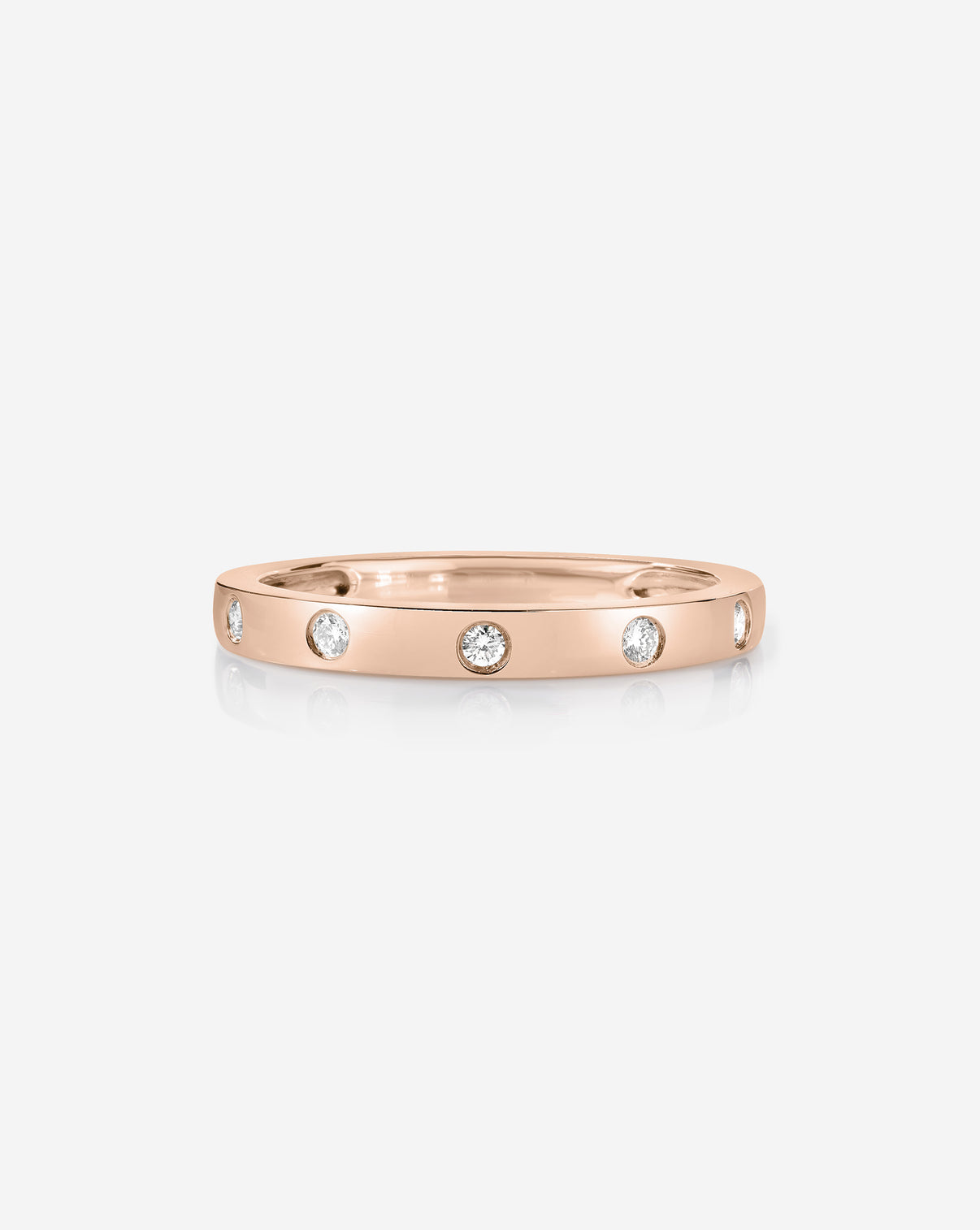 Inlay diamond ring in 14k rose gold, side view highlighting diamond brilliance and band craftsmanship