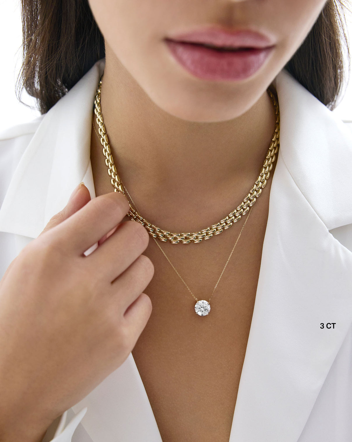 Lab Grown Round Diamond Necklace in Yellow Gold 3 Carat diamond on model styled with a gold necklace