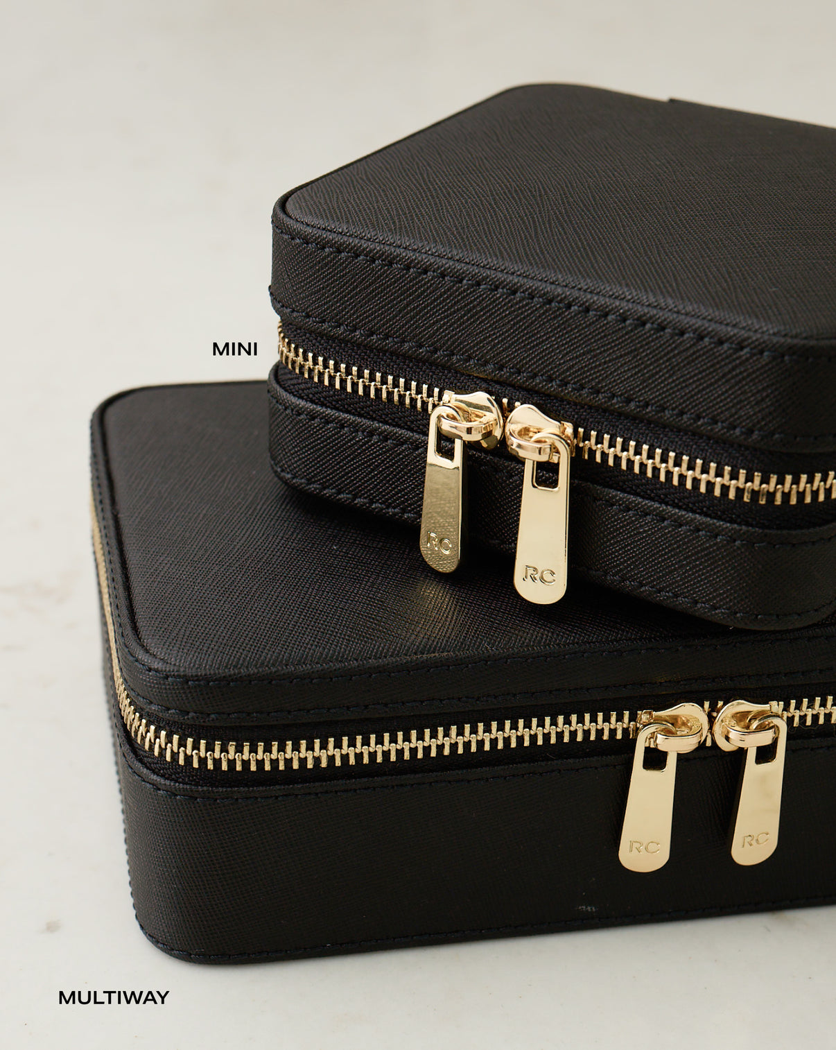 Multiway Leather Jewelry Case shown stacked underneath the Mini Leather Jewelry Case with text labels.