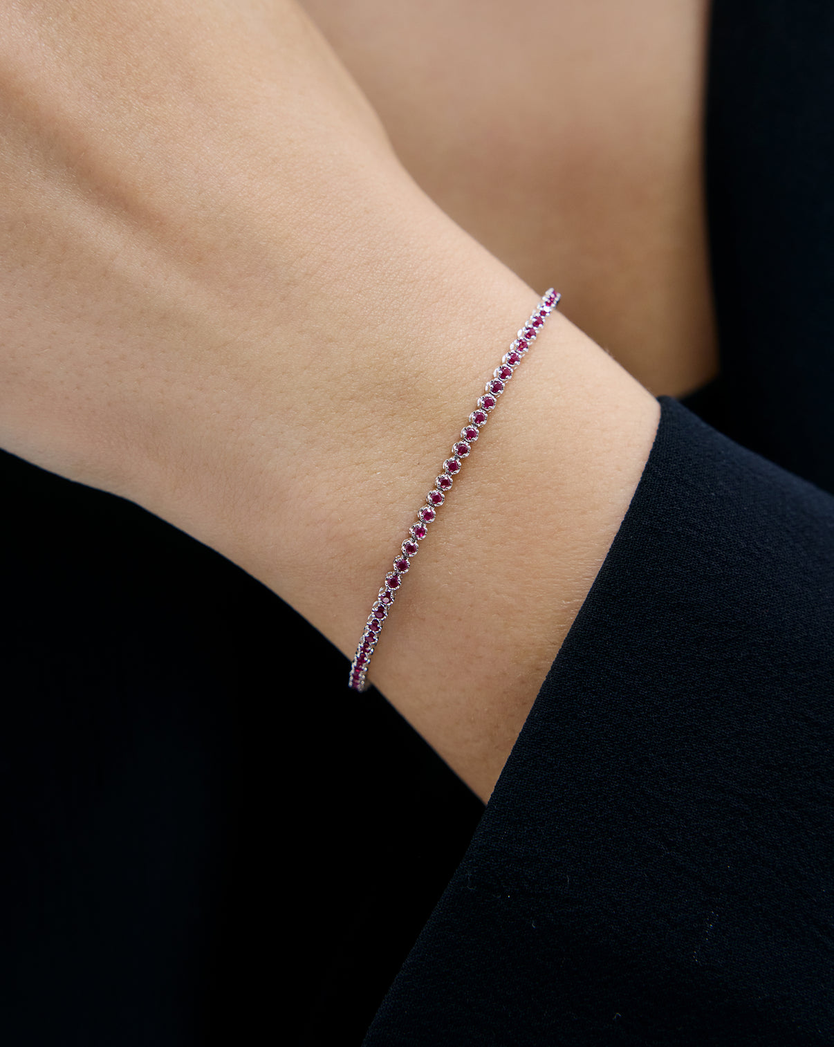 Mini Gemstone Tennis Bracelet half on model  white gold 43895712219224