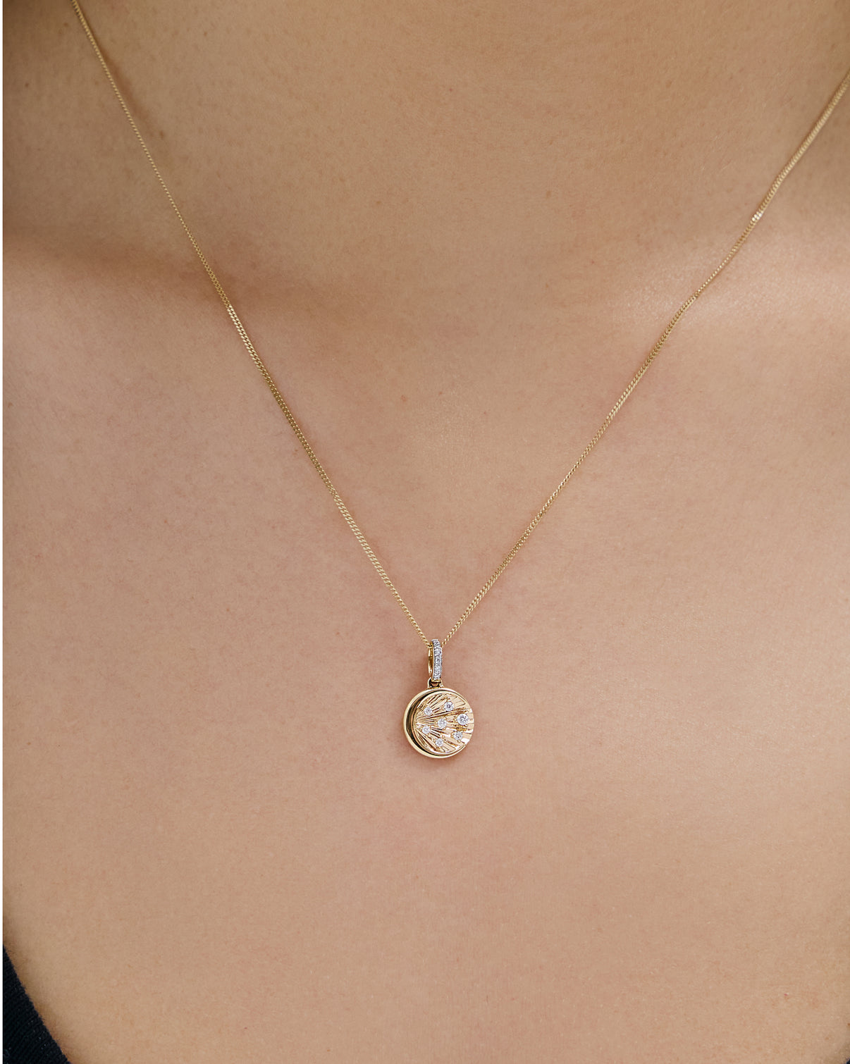 Moon & Stars Diamond Charm shown on a gold necklace