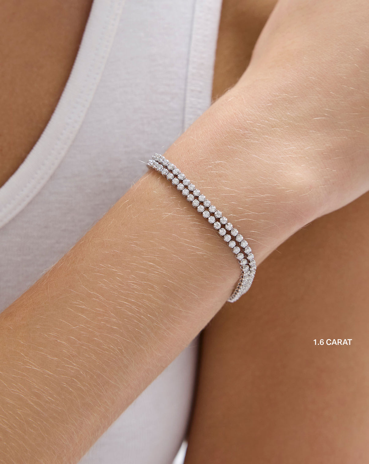 1.6 carat worn as bracelet on wrist. double stacked. global
