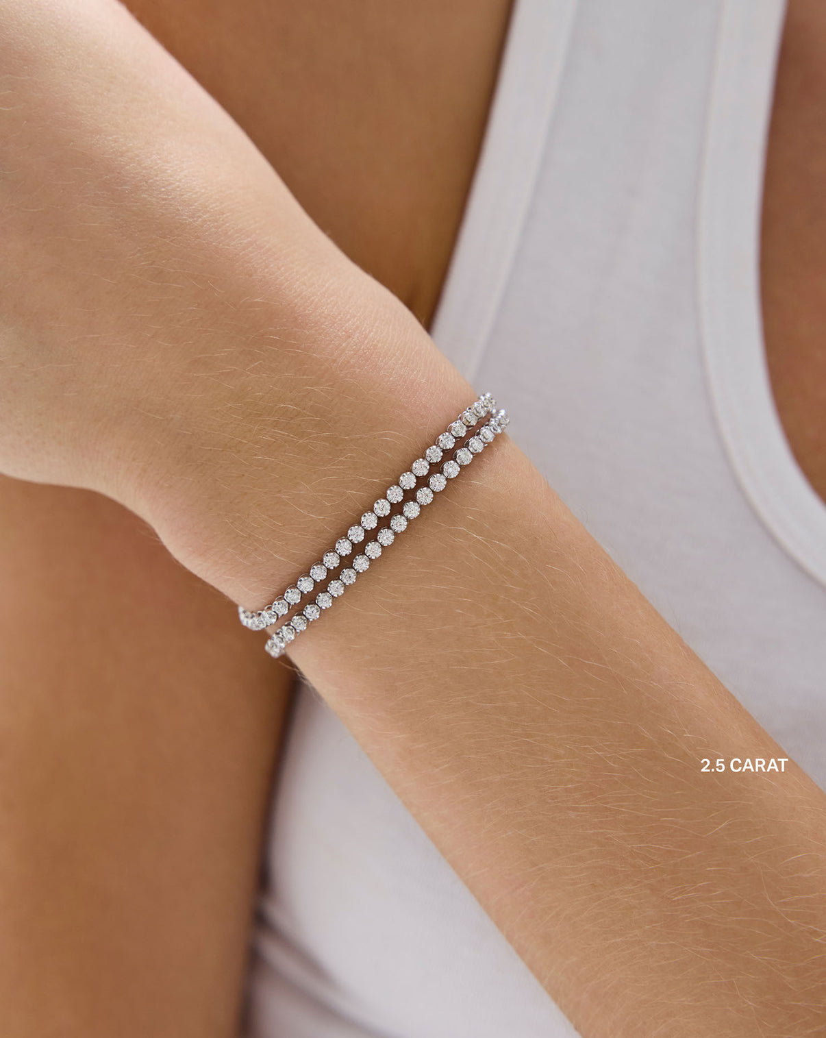 2.5 carat worn as bracelet on wrist. double stacked. global