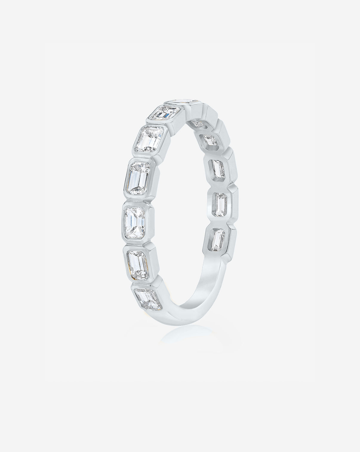 Sideways Emerald Bezel Eternity Band with 3/4 diamond coverage in Platinum standing