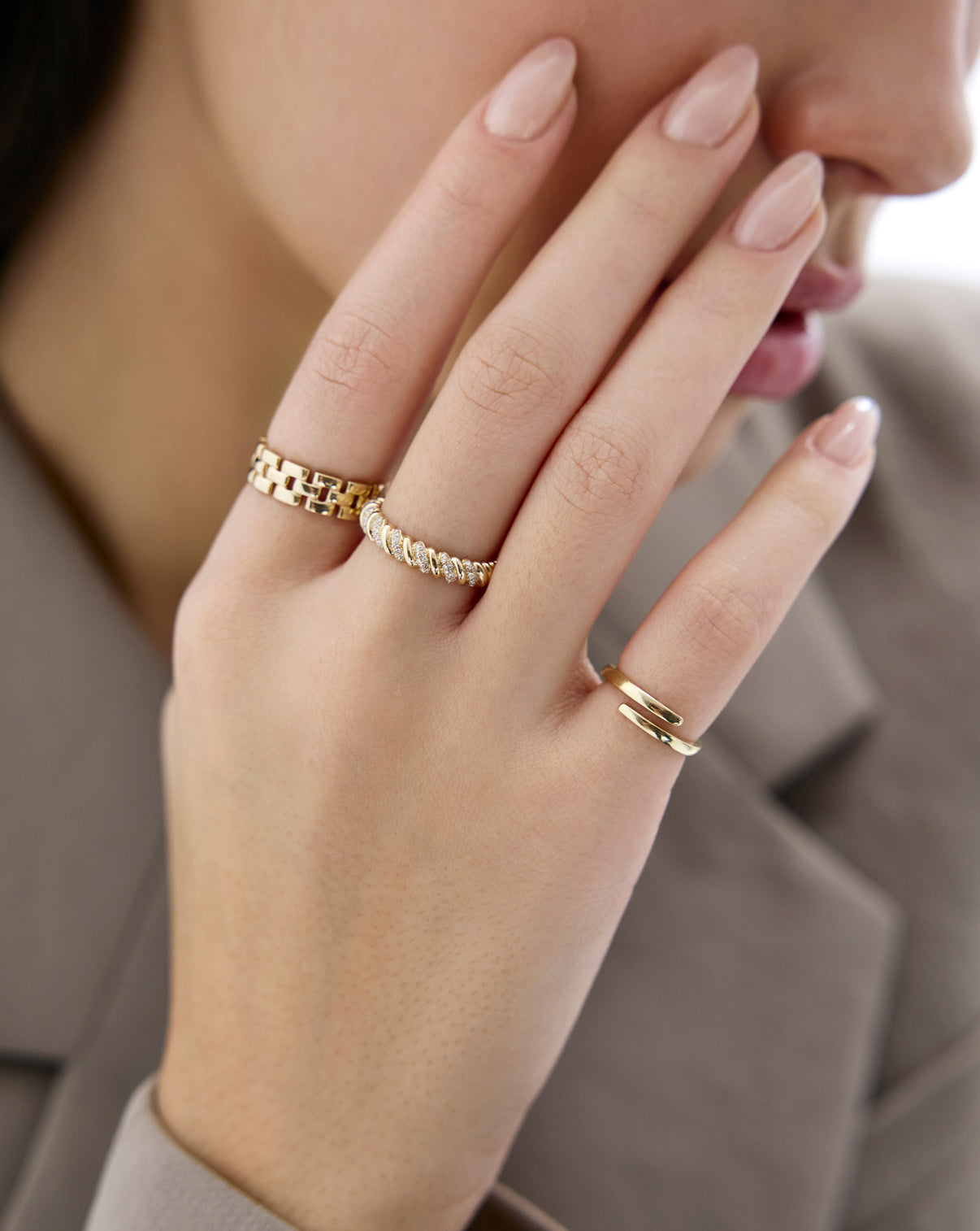 Open wrap ring in 14k solid gold worn by model GLOBAL