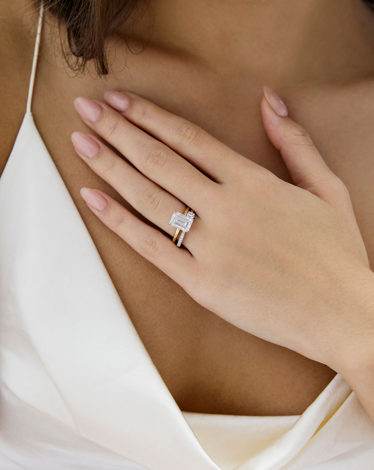Open Round Diamond Band paired with emerald shaped diamond ring