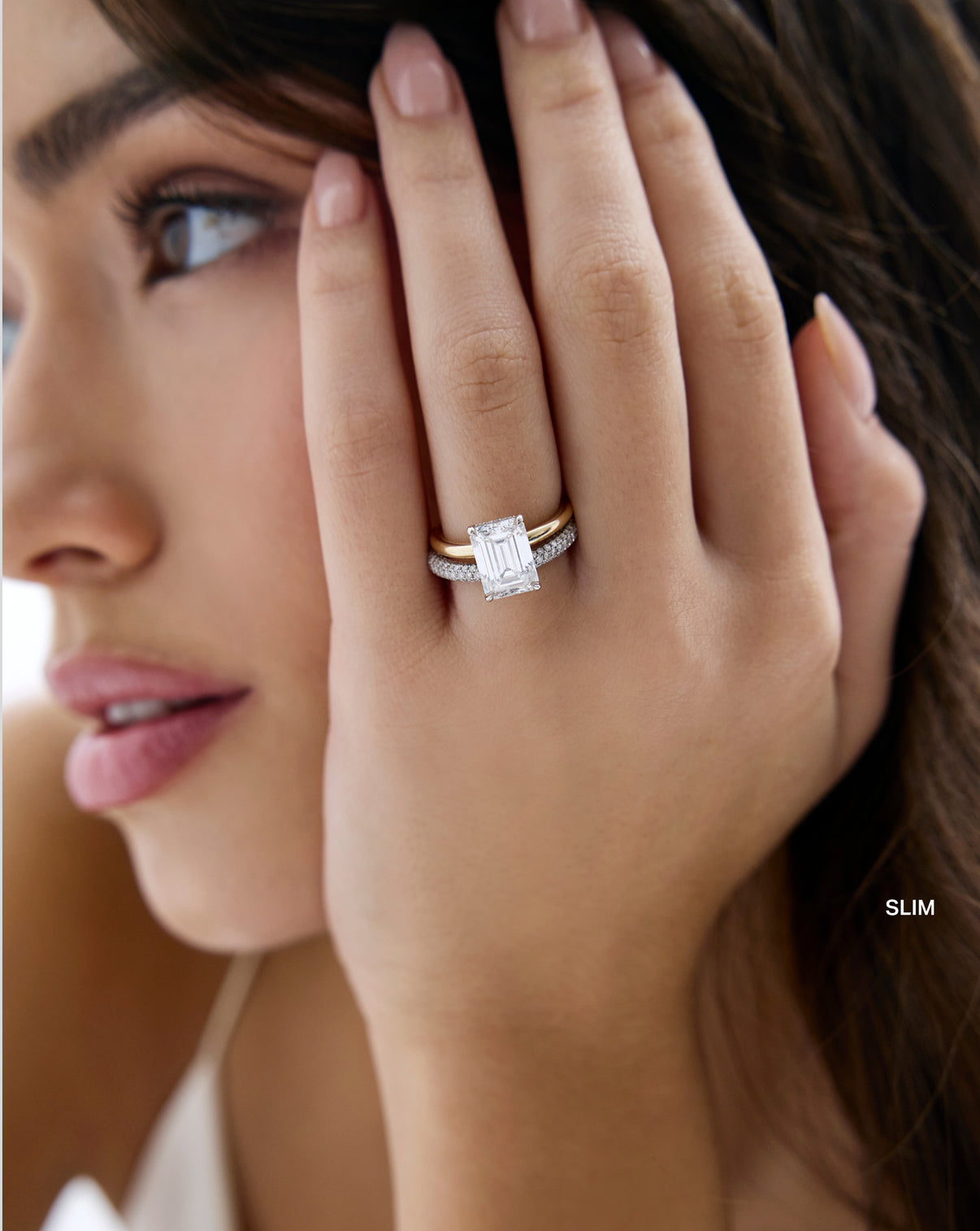 Slim Pavé Cloud Eternity Band paired with engagement ring worn by model - global