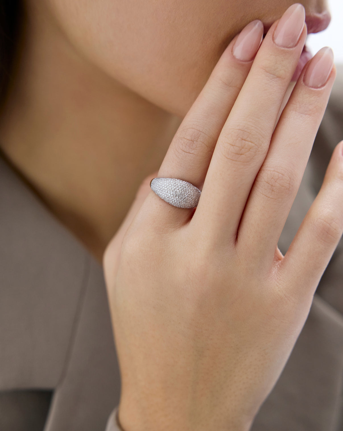 Close up of our Pavé Jumbo Diamond Cloud Ring with 321 round natural diamonds worn by model