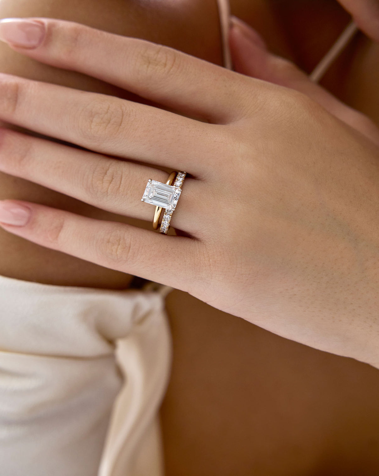 model wearing perfect pave stacked with engagement ring global