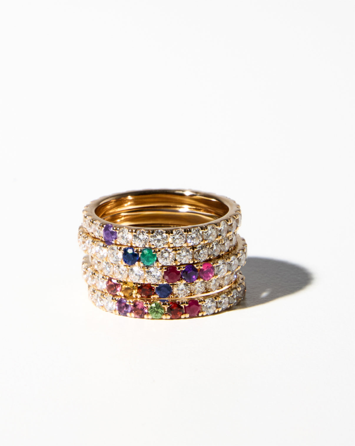 Personalized Perfect Pavé Diamond Rings in yellow gold stacked on top of each other GLOBAL